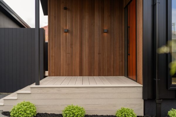 Decking entrance with garden edging and planting in Christchurch
