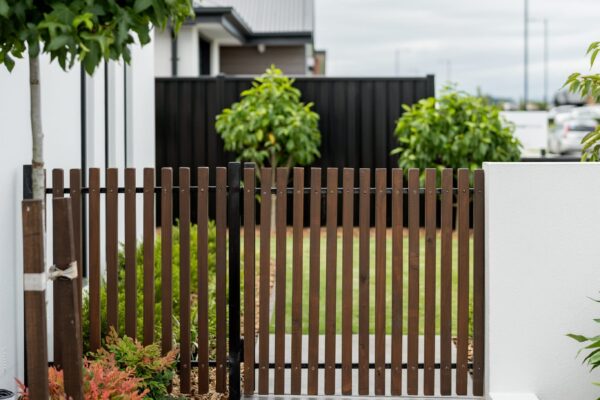 Timber gates, concrete paths and garden planting in Canterbury