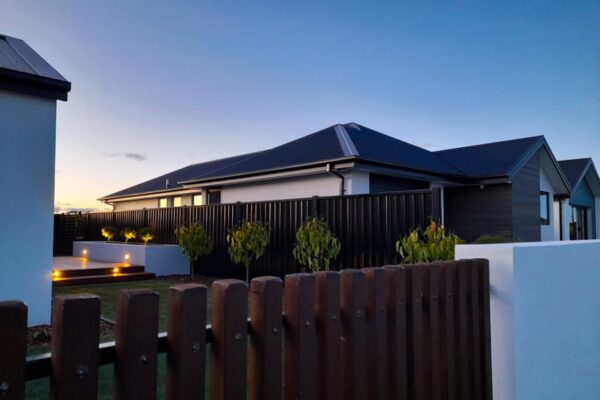 Timber fencing, block walls and garden planting in Selwyn